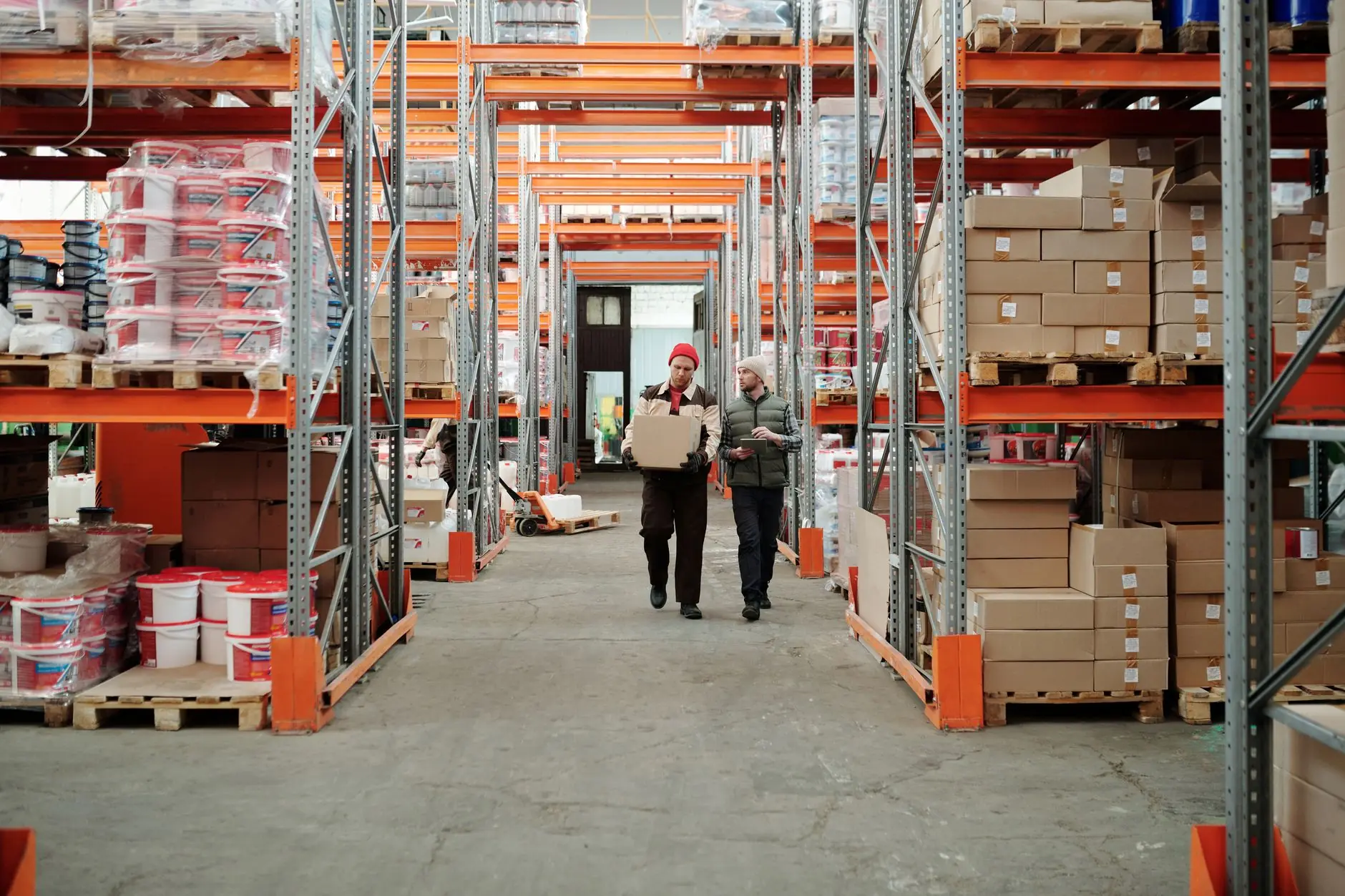 Warehouse aisle with stocked shelves